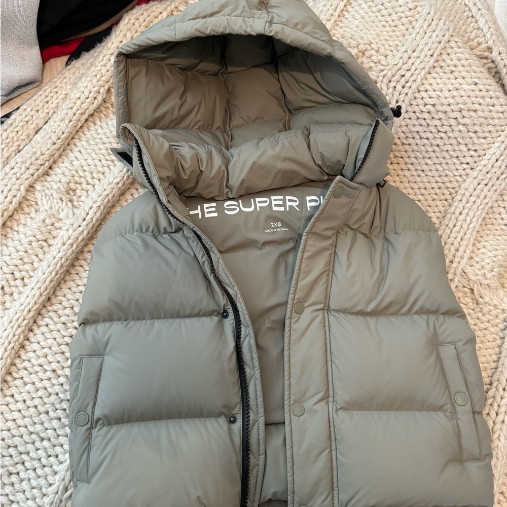 The Super Puff Olive Green Puffer Vest